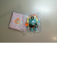 A set of a soft toy and a small scarf