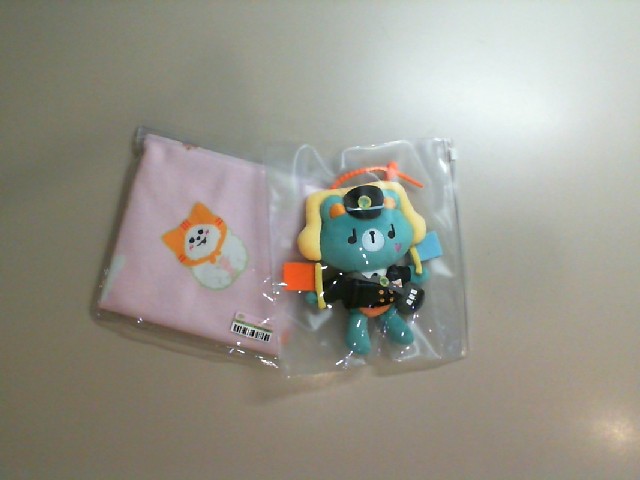 A set of a soft toy and a small scarf A set of a soft toy and a small scarf