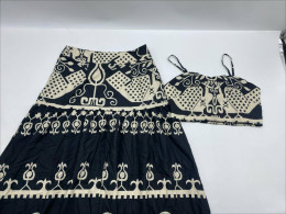 Black tube top and black long skirt