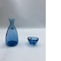 Blue glass water bottle and blue glass cup