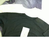 Set of 3 T-shirts. Black, white, purple Set of 3 T-shirts. Black, white, purple