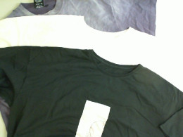 Set of 3 T-shirts. Black, white, purple