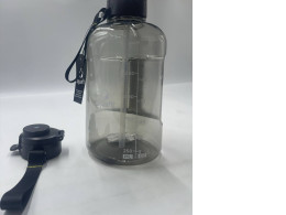 Black clear plastic bottle
