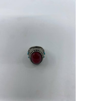 Silver ring with red beads