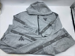 Women's gray hooded sweatshirt and gray pants