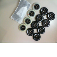 Set of 12 roller skate wheels + 2 plastic wheel covers