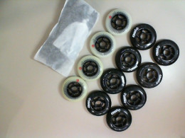Set of 12 roller skate wheels + 2 plastic wheel covers
