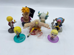 Set of coin-sized japanese figures