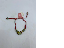 Red bracelet with beads 