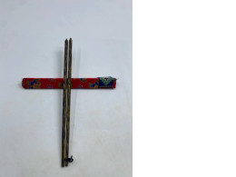 Coconut shell chopsticks in a red box Coconut shell chopsticks in a red box