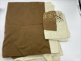 Cream-brown bedsheet and pillowcases Cream-brown bedsheet and pillowcases