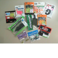 A set of 11 different plastic and silicone fishing baits