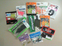 A set of 11 different plastic and silicone fishing baits