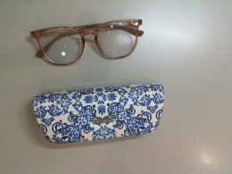 Blue case + prescription glasses