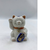 Glass piggy bank in the shape of a Japanese cat