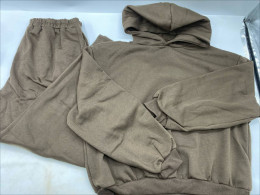 Brown hooded sweatshirt and brown pants Brown hooded sweatshirt and brown pants