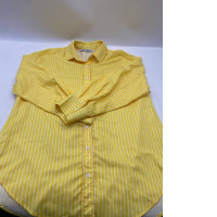 Yellow long-sleeved shirt with white stripes