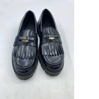 H&M fringe-trimmed loafers in black with a chunky sole. 