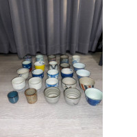 a large set of decorative mugs for the tea ceremony number one