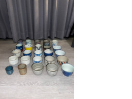 a large set of decorative mugs for the tea ceremony number one