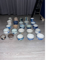 a large set of decorative mugs for the tea ceremony number four