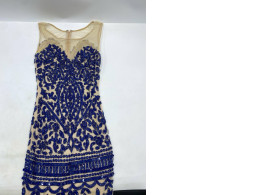 Cream colored evening dress with blue beading