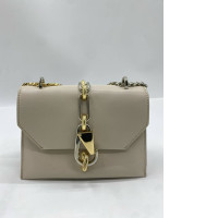 Charles & Keith Trice Metallic-Accent Belted Shoulder Bag in a chalk color. 