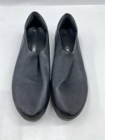 Black leather ballet slip-on shoes from Trippen.