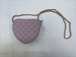 Women's pink heart-shaped shoulder bag