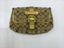  Coach Signature Monogram Front Buckle Y2K Vintage Shoulder Bag with gold metallic accents. 