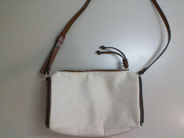 Small beige bag