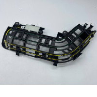 A set of two Mitsubishi headlight brackets