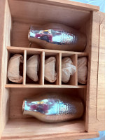 a set of 2 ceramic teapots and 5 cups