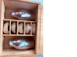 a set of 2 ceramic teapots and 5 cups