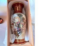 ceramic vase with floral painting and wooden box