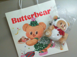 A set of paper gift bag and soft toy