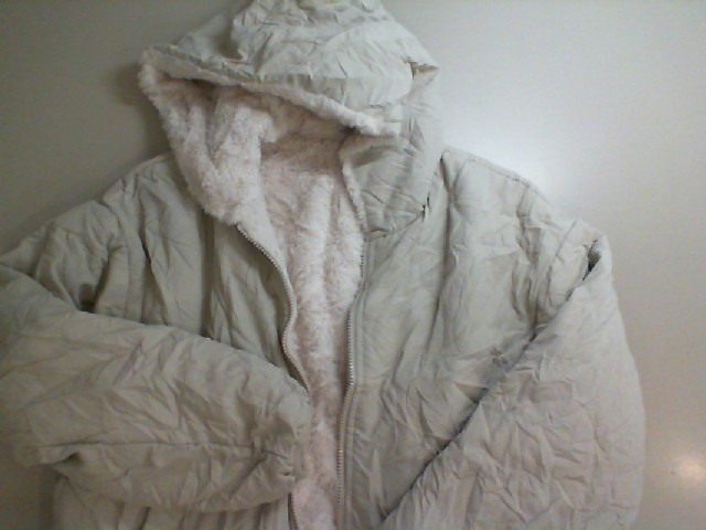 Light-colored women's zippered jacket with faux fur Light-colored women's zippered jacket with faux fur