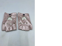 pink PU leather fingerless gloves with a heart-shaped cutout. pink PU leather fingerless gloves with a heart-shaped cutout.