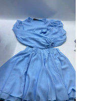 Women's long-sleeved round-neck shirt and women's blue short skirt