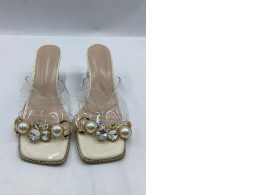 Women's clear platform sandals decorated with faux pearls and crystals.