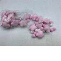Set of pink plush star and ball beads, likely used for crafts or decoration. 