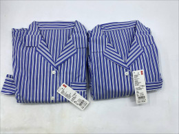 Set of 2 Uniqlo  pair of blue and white striped revere collar pyjamas. 