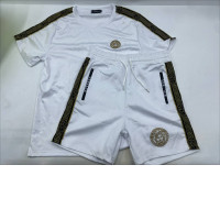 white Versace t-shirt and shorts set featuring the gold-tone Medusa logo and Greca pattern trim white Versace t-shirt and shorts set featuring the gold-tone Medusa logo and Greca pattern trim