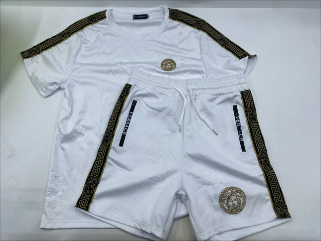 white Versace t-shirt and shorts set featuring the gold-tone Medusa logo and Greca pattern trim white Versace t-shirt and shorts set featuring the gold-tone Medusa logo and Greca pattern trim