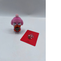 Crybaby figure and a gift card