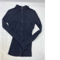 Women's black long-sleeved crew neck zip-up sweatshirt.