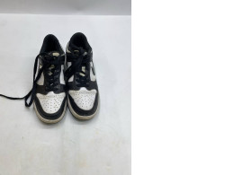 Black and white Nike Dunk Low Retro "Panda" sneakers. Black and white Nike Dunk Low Retro "Panda" sneakers.