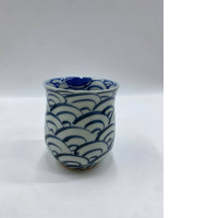 Large, tall, blue teacup with white patterns, Japanese. Large, tall, blue teacup with white patterns, Japanese.