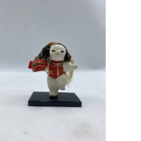 AJapanese Gojo doll depicting a chubby boy performing Shishimai (lion dance).