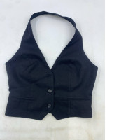 Black tie-neck vest with a V-neck and front button closure. Black tie-neck vest with a V-neck and front button closure.